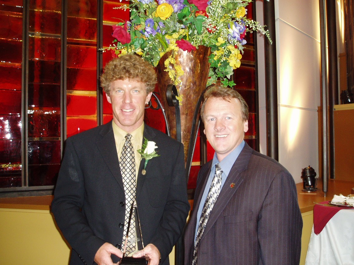 6 Grant Statham Receiving Public Service Award from Alan Latourelle